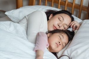 mom daughter sleeping