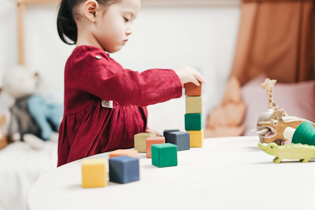 toddler playing with blocks