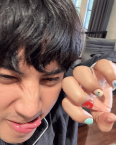 Maki Filipino singer red and teal nails