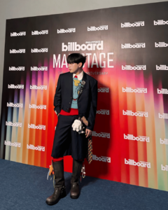 Maki Filipino singer wearing a suit paired with jorts for Billboard Mainstage event