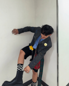 Maki Filipino singer wearing checkered socks and chelsea boots or platform boots